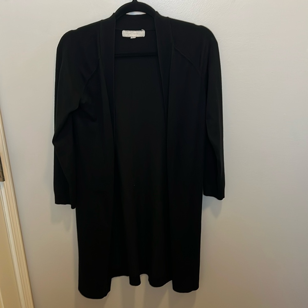 Black cardigan purchased at Marshall’s. Unable to tell brand from tag pictured.